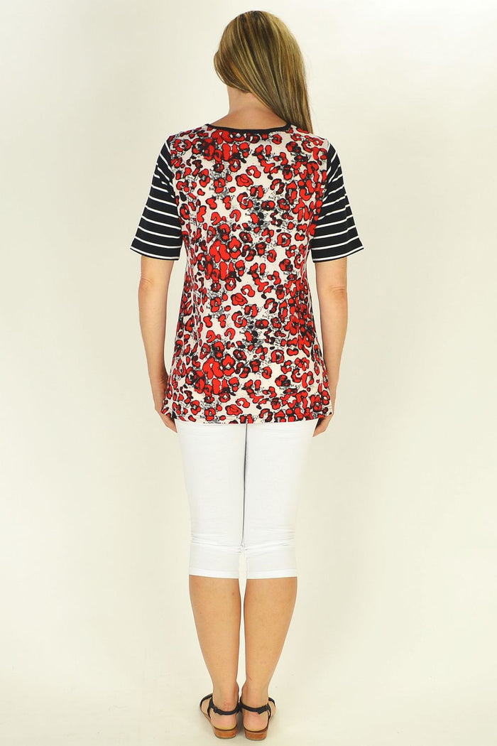 Sun Rose Beverly Tunic displayed on a hanger, showcasing its lightweight fabric and relaxed fit perfect for casual wear.