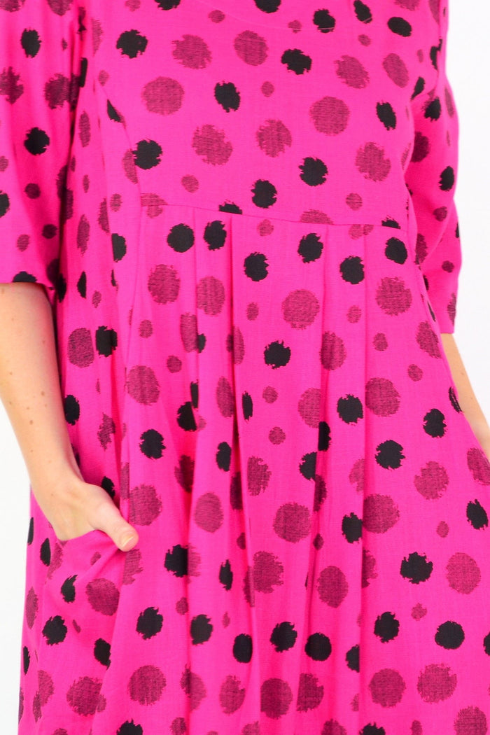 Hot pink dotted linen blend tunic dress by Ruby Rain, featuring a relaxed fit with long sleeves and a casual, stylish silhouette.