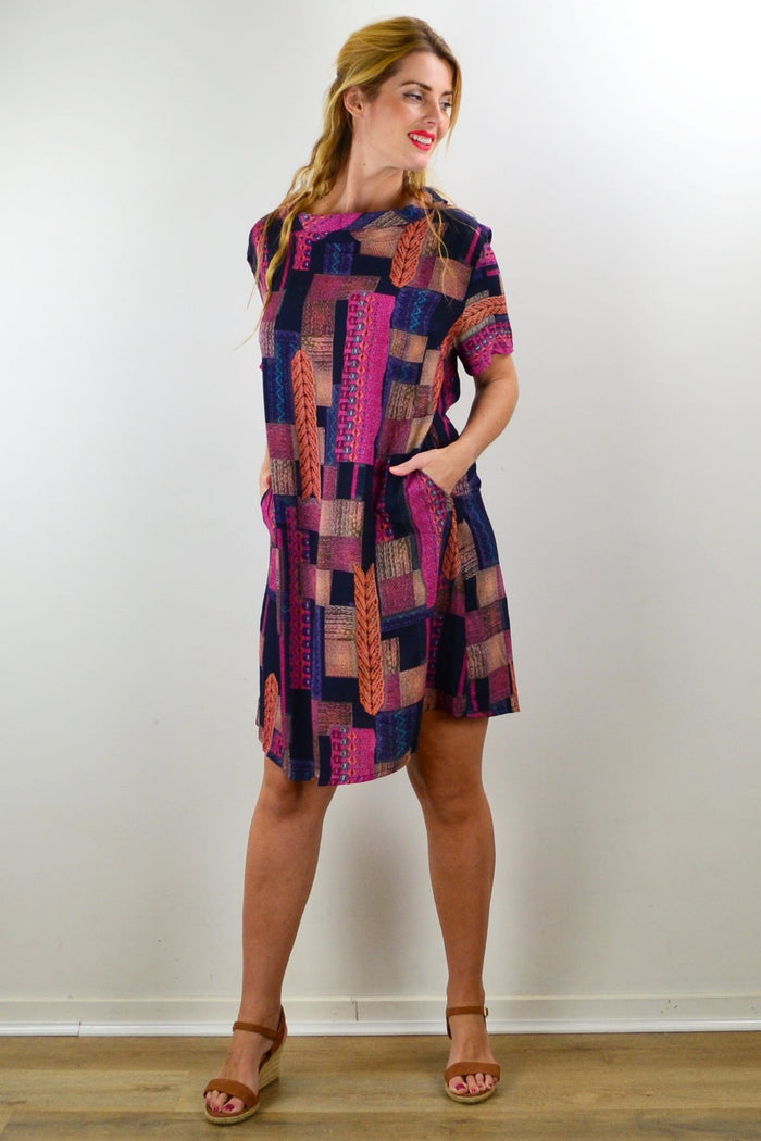 I Love Tunics Mishca tunic dress featuring a relaxed fit, long sleeves, and a stylish casual design displayed on a model.
