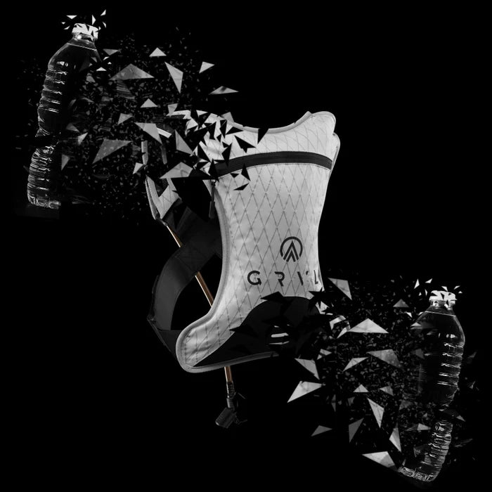 GRVL sustainable gravel cycling hydration pack with recycled plastic bottle design on black background