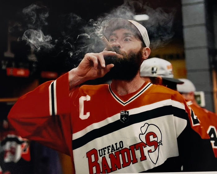 Steve Priolo Unsigned Smoking Cigar Photo