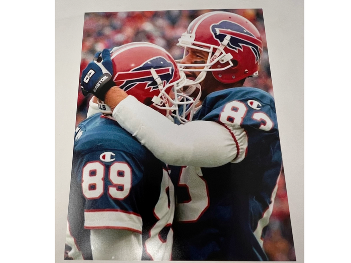 Andre Reed and Steve Tasker Hugging Unsigned Photo