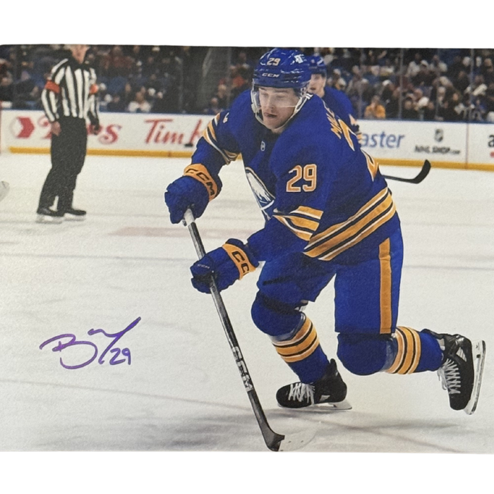 Beck Malenstyn Signed Skating with Puck in all Blue Uniform Photo