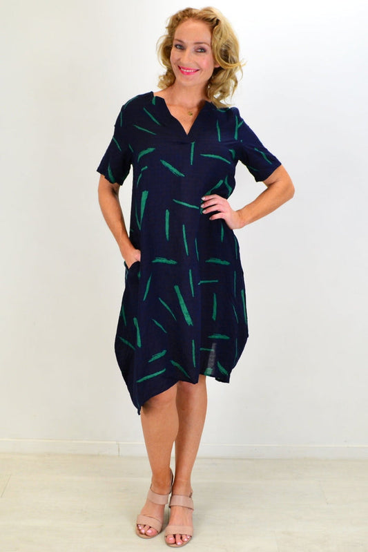 Blue and green splash print tunic dress by Ruby Rain, featuring a flowy silhouette and vibrant abstract design.