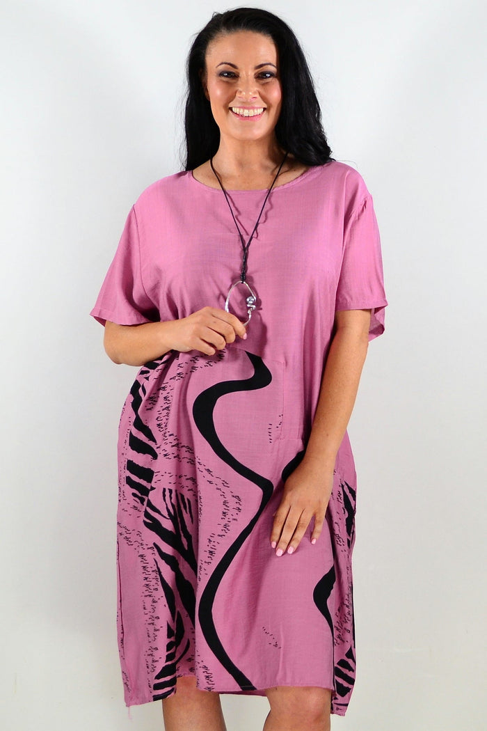 Dusty pink striped tunic dress by Sunshine, featuring a relaxed fit and casual style, shown on a model.
