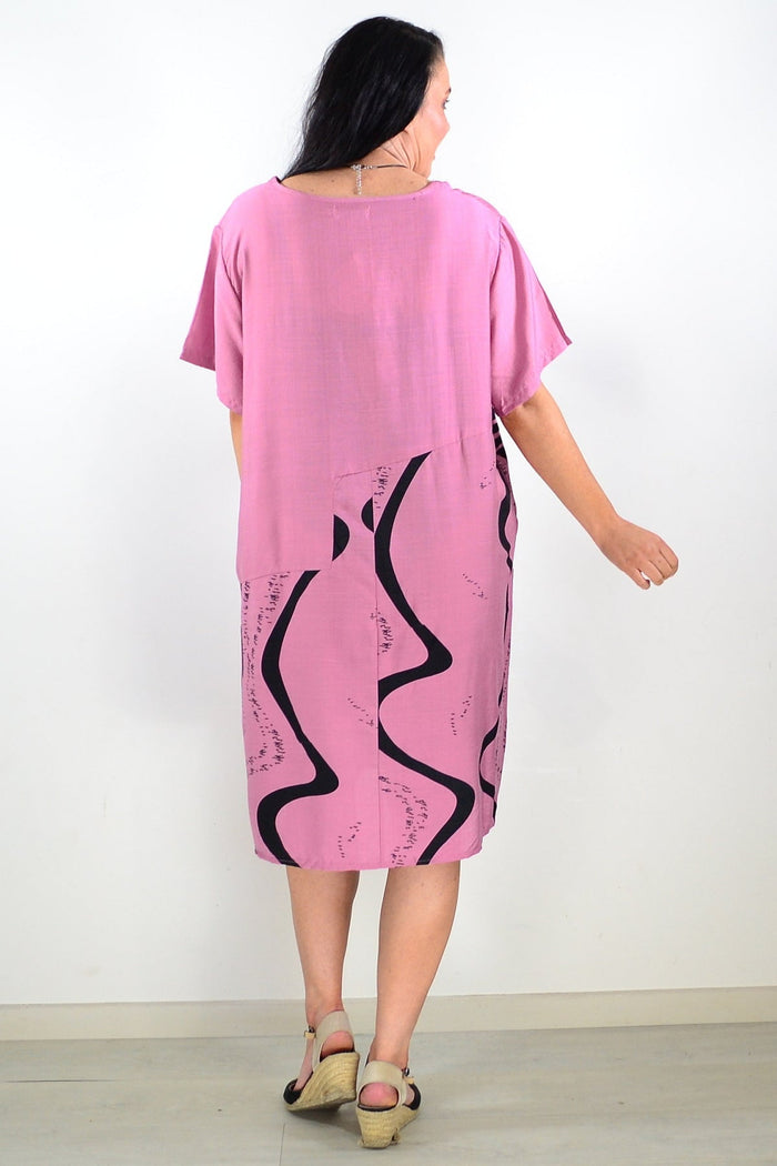 Dusty pink striped tunic dress by Sunshine, featuring a relaxed fit and casual style, worn with short sleeves and a round neckline.