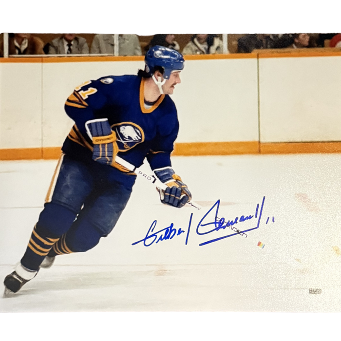 Gilbert Perreault Signed Skating in Blue with Stick Down Horizontal Photo