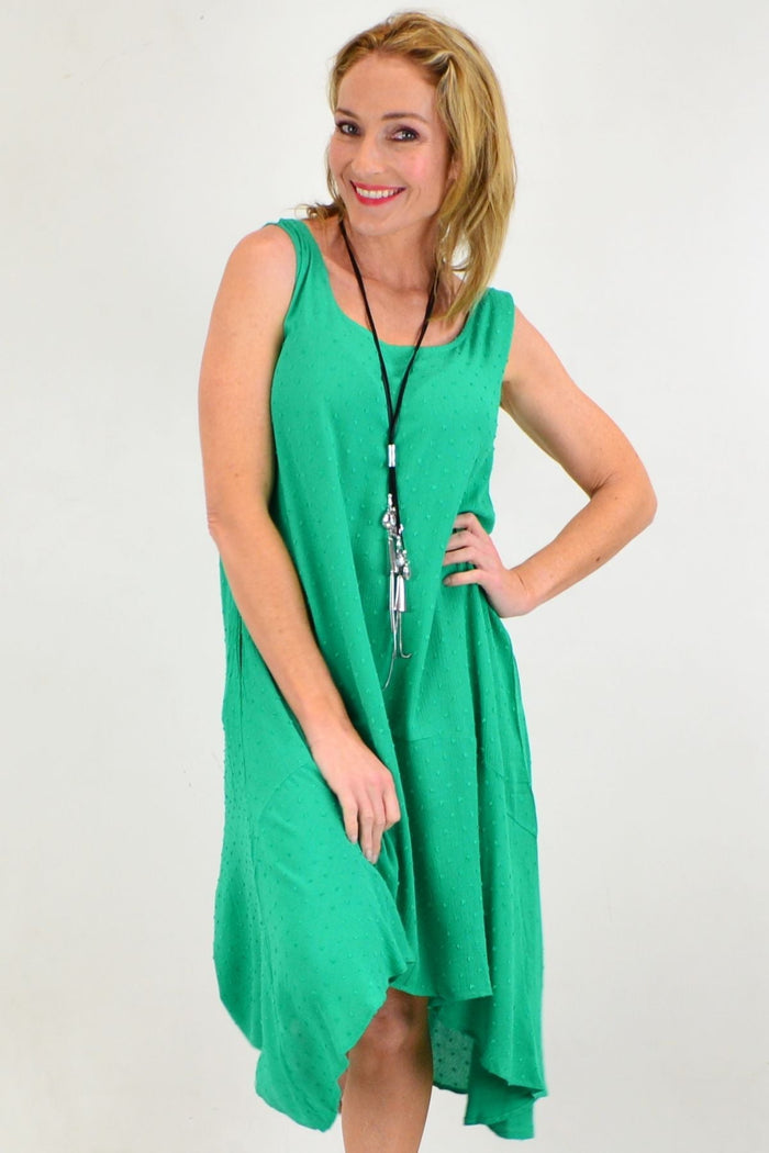 Willow Tree grass green ladies day shift dress tunic with long sleeves and relaxed fit, displayed on a hanger.