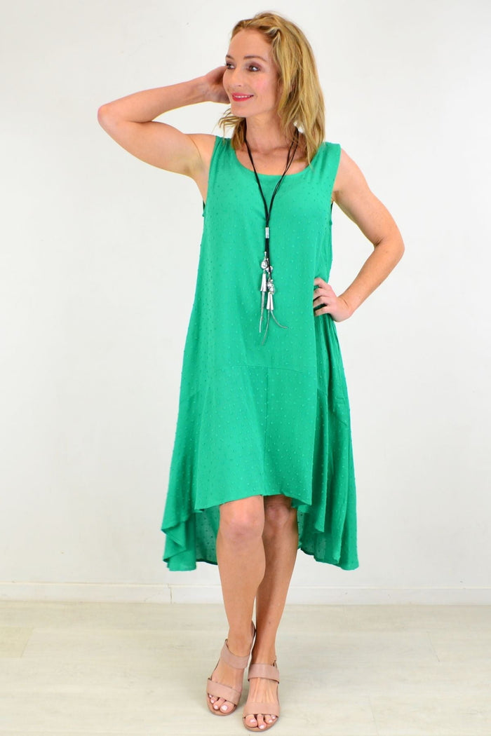 Willow Tree grass green ladies' day shift tunic dress with long sleeves and a relaxed fit, displayed on a mannequin.