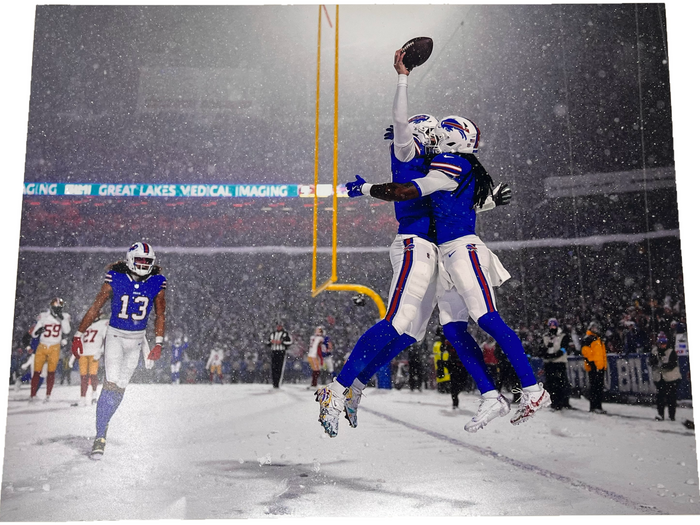 Josh Allen and James Cook Unsigned Jumping in Snow Celebration Photo