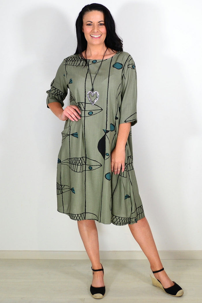 Khaki cotton linen tunic dress by Ruby Rain, featuring a relaxed fit and casual style, shown on a model.