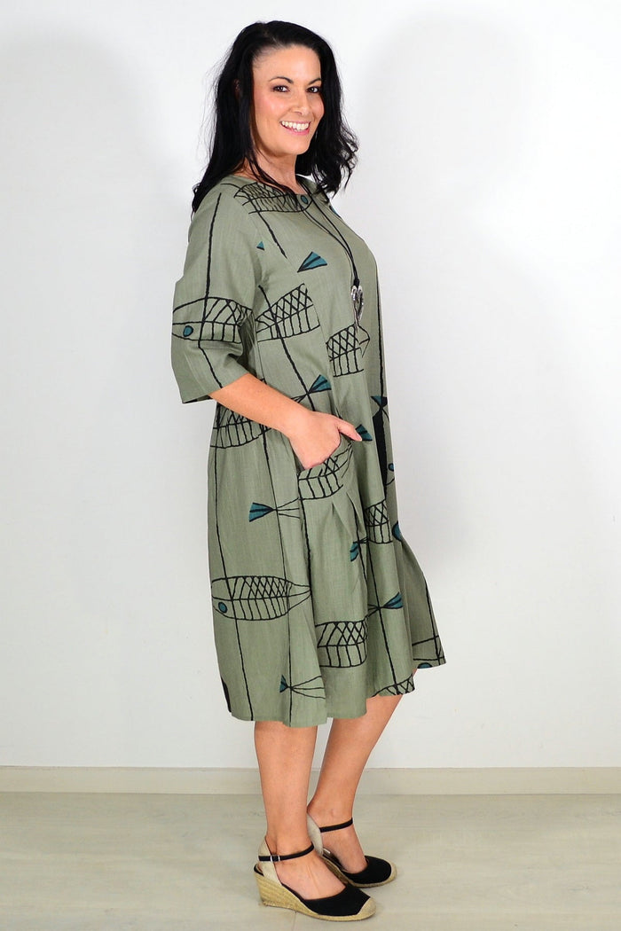 Khaki cotton linen tunic dress by Ruby Rain, featuring a relaxed fit with long sleeves and a simple, elegant design.