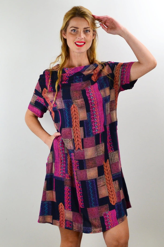 I Love Tunics Mishca tunic dress, long, flowy tunic with a relaxed fit and floral pattern, displayed on a mannequin.
