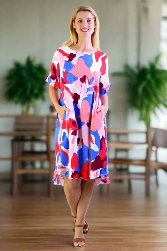 Multicolour abstract summer dress tunic by New U Collection with vibrant, flowing fabric and stylish design.