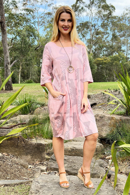 Pink Forest Midi Tunic Dress by Hourglass, showcasing a flowy, knee-length tunic with floral forest print and relaxed fit.