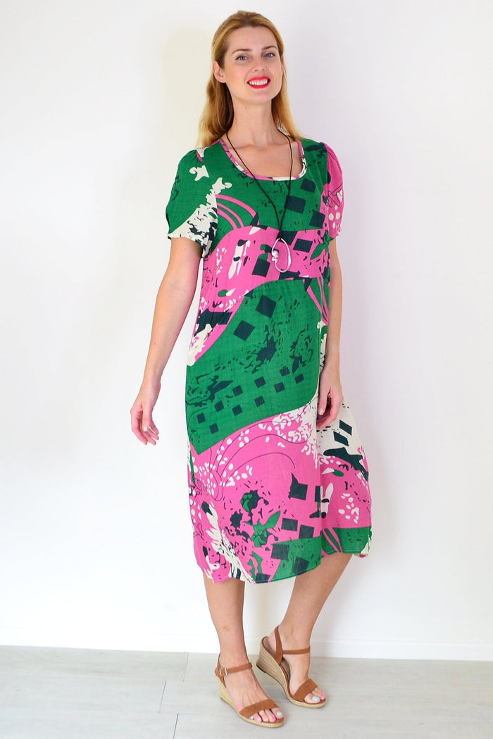 Pink and green paint splash tunic dress by Wishstone, casual sleeveless tunic with vibrant abstract design.