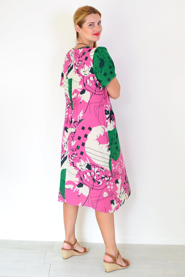 Pink and green paint splash tunic dress by Wishstone, featuring a vibrant, artistic design and relaxed fit for casual wear.