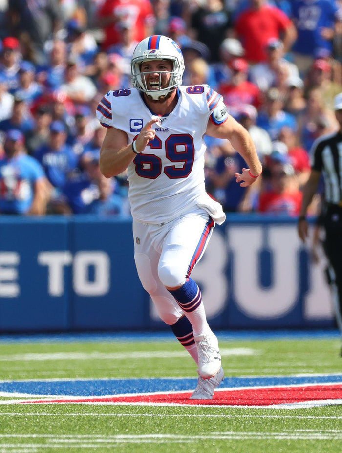 Reid Ferguson Unsigned Running Downfield Post Long Snap in White Jersey Photo