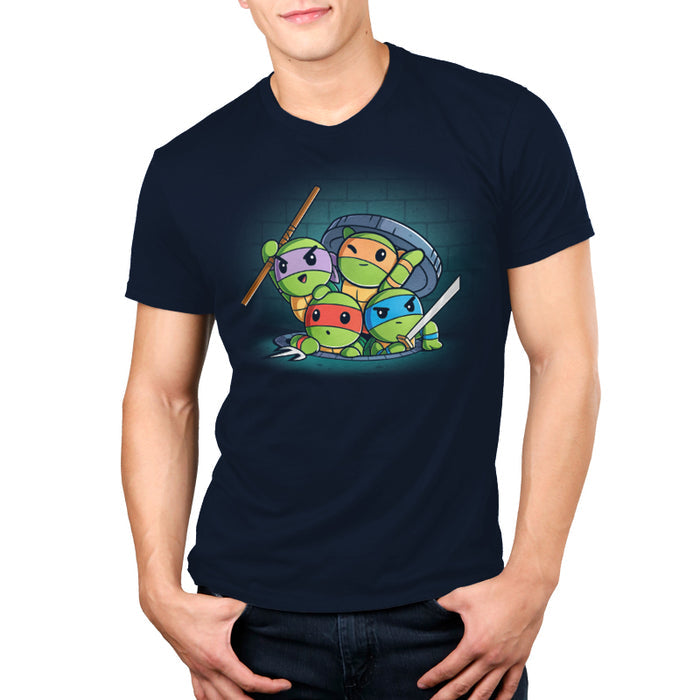 Premium Cotton T-shirt_TeeTurtle navy blue Turtle Time! apparel featuring Raphael, Leonardo, Michelangelo, and Donatello climbing out of a manhole.