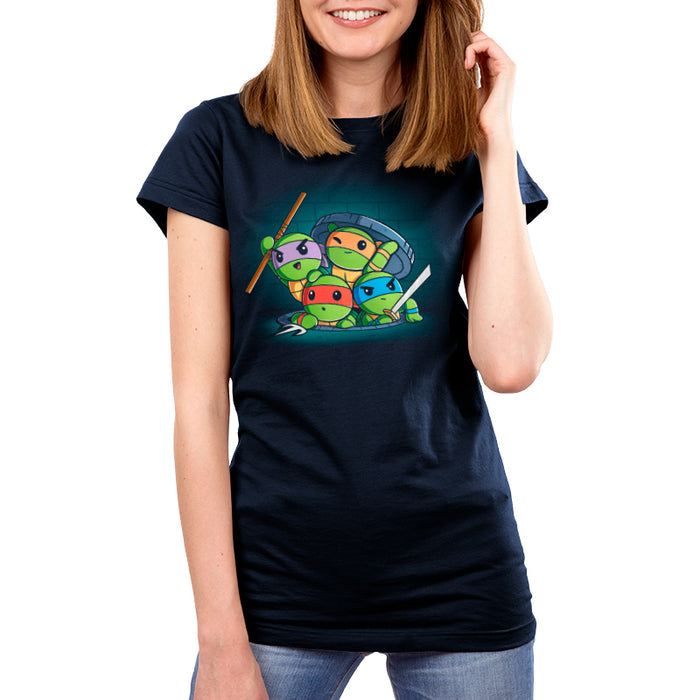 Premium Cotton T-shirt_TeeTurtle navy blue Turtle Time! apparel featuring Raphael, Leonardo, Michelangelo, and Donatello climbing out of a manhole.
