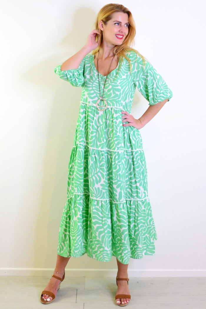 White and green tiered tunic dress from New U Collection, featuring a flowy, layered design perfect for casual wear.